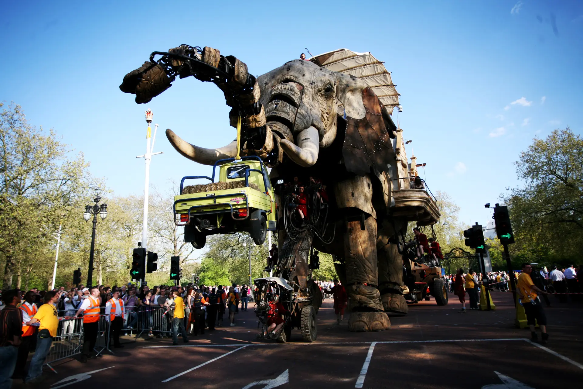 The Sultan's Elephant, a three-storey mechanical elephant by Royal de Luxe, moving through central London in May 2006 as crowds line the street