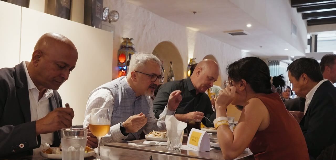 Guests talking over lunch